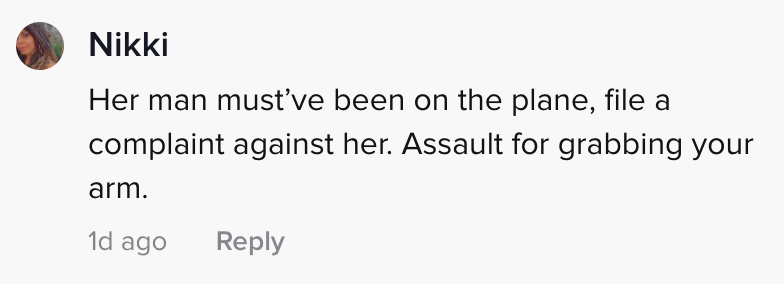 Her man must've been on the plane, file a complaint against her. Assault for grabbing your arm!