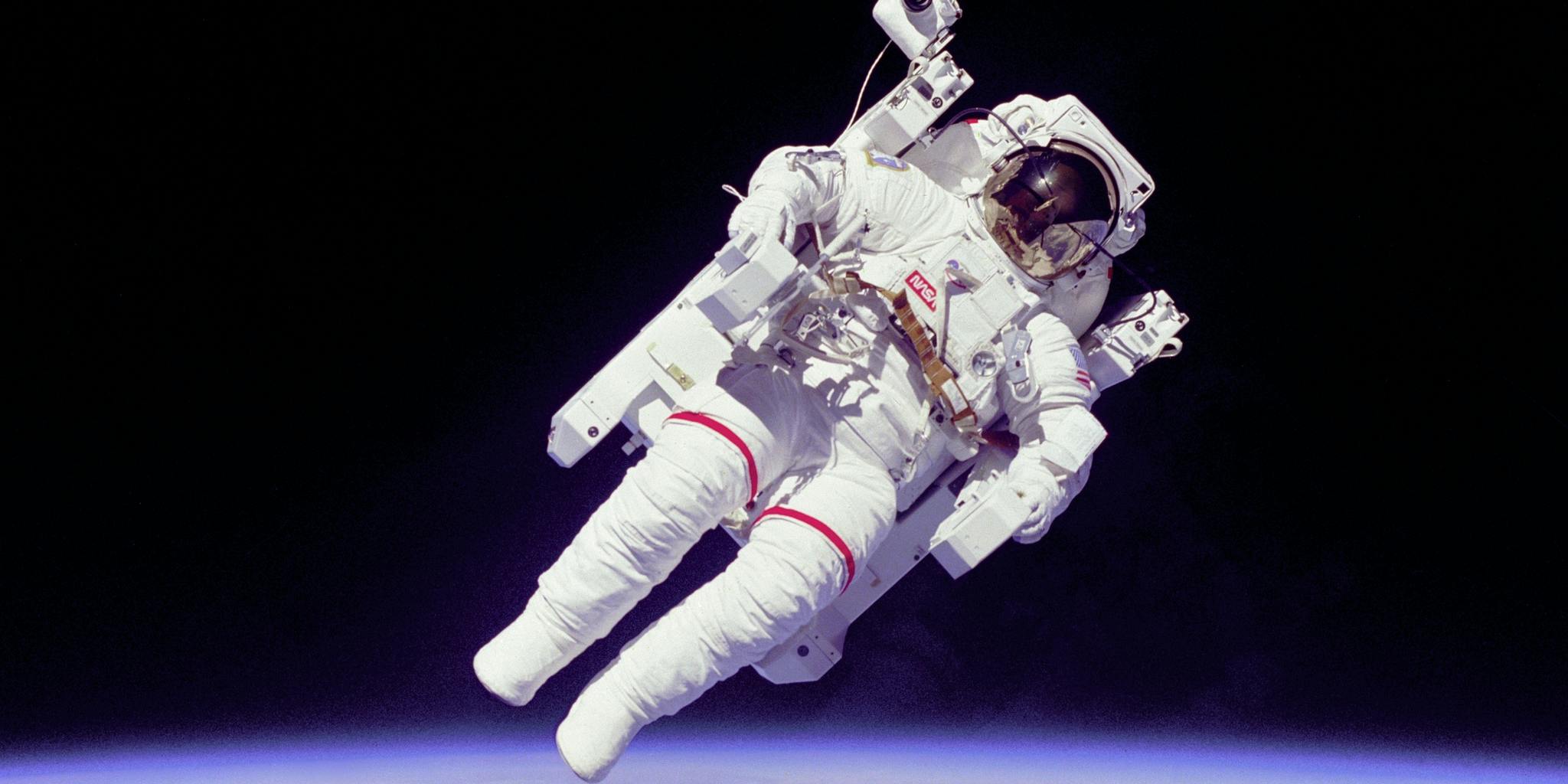 Astronaut driving a car in outer space on Craiyon