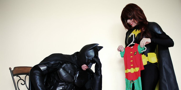 Redditors dressed as Batman and Batwoman announce their pregnancy.