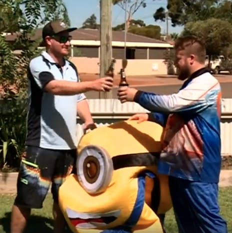 minion and friend share beer