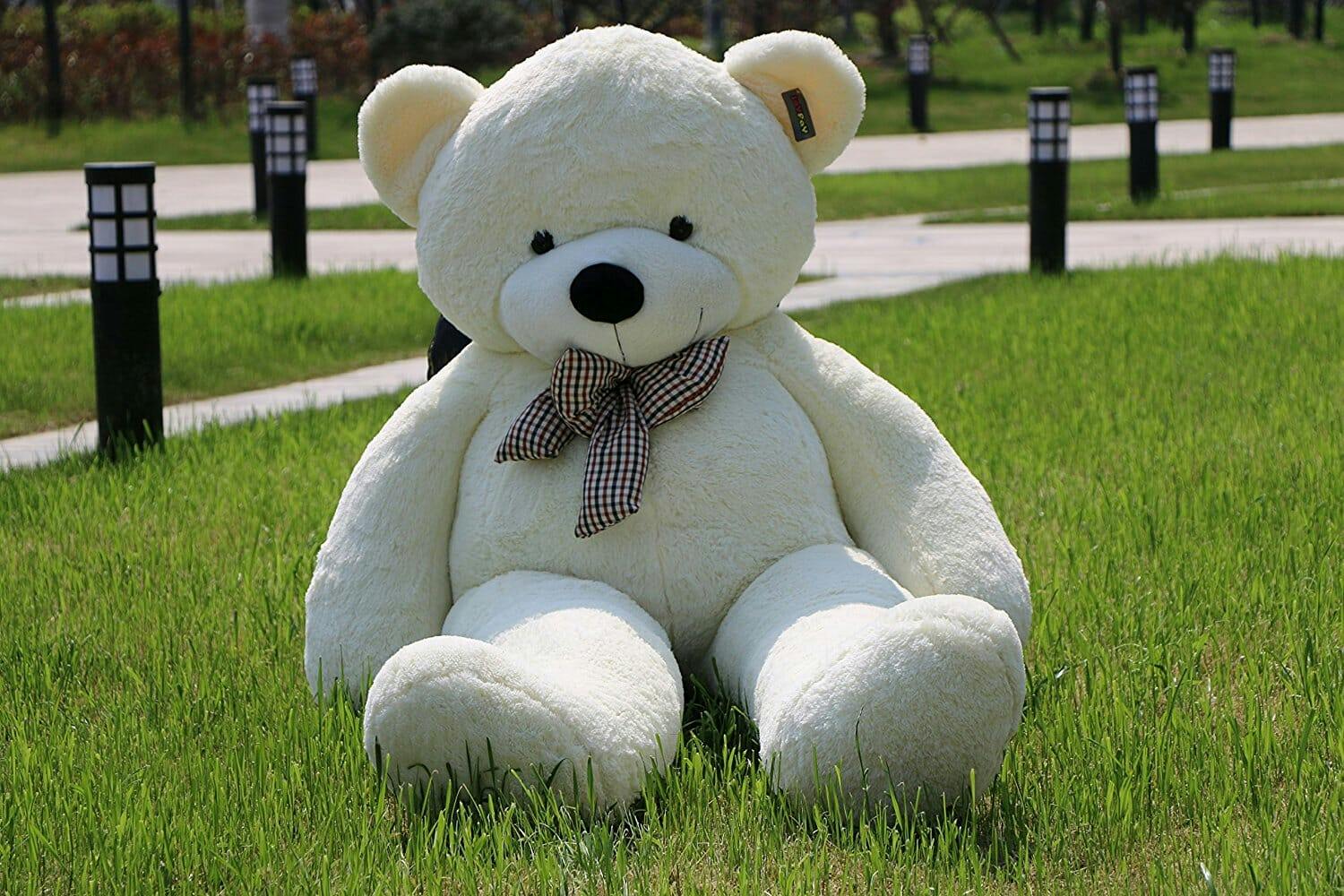 stuffed bear on grass