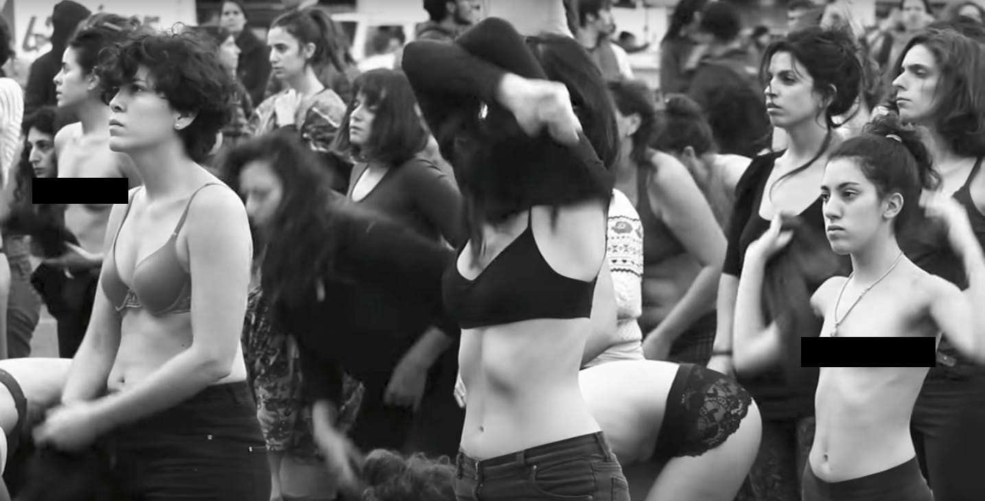 Feminist demonstrators participated in a naked flash mob protesting violenc...