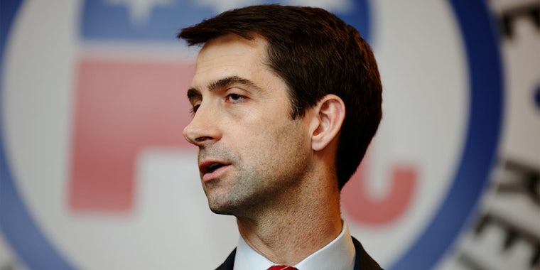 Tom Cotton in front of GOP logo