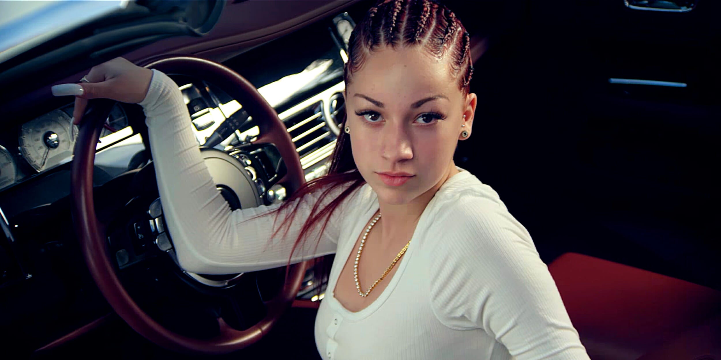 Danielle Bregoli behind steering wheel