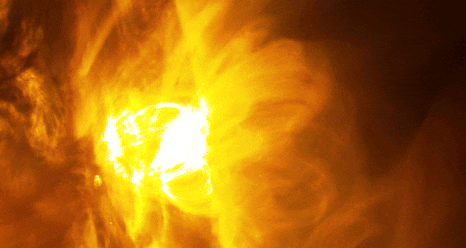 NASA caption: Giant magnetic loops dance on the sun’s horizon in concert with the eruption of a solar flare—seen as a bright flash of light—in this imagery from NASA’s Solar Dynamics Observatory, captured Jan. 12-13, 2015.