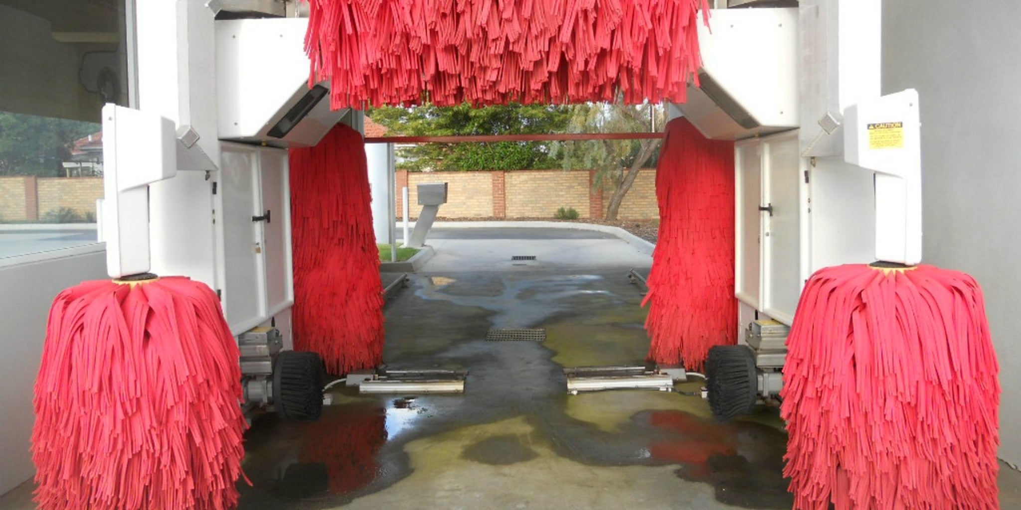 Carwash manager somehow emerges unscathed after scrubber sucks him in