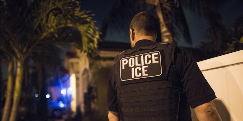A U.S. Immigration and Customs Enforcement agent during a raid in Florida.