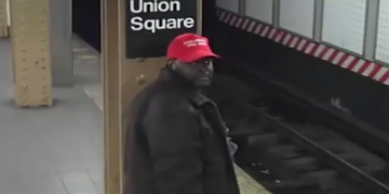 A man wearing a MAGA hat is wanted for allegedly pushing a Latino subway rider onto the tracks.