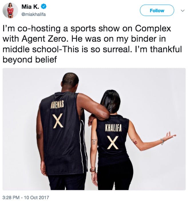 Mia Khalifa's tweet announcing her show with Gilbert Arenas, both of them facing away and wearing Jerseys with 'X' on them.