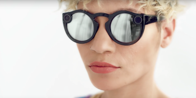 Snap second-generation Spectacles on a short-haired woman