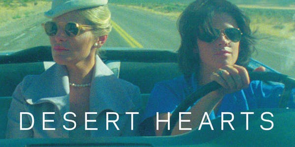 A scene from desert hearts showing two women driving in a car
