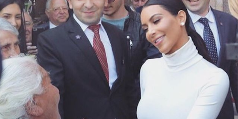 Kim Kardashian smiles at an elderly fan