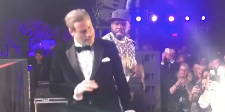 John Travolta dances onstage with 50 Cent
