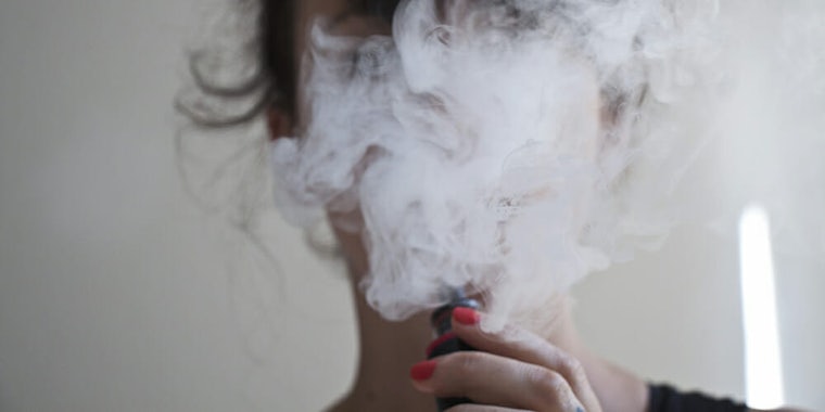 A woman was hospitalized with a serious lung condition after three weeks of smoking e-cigs.