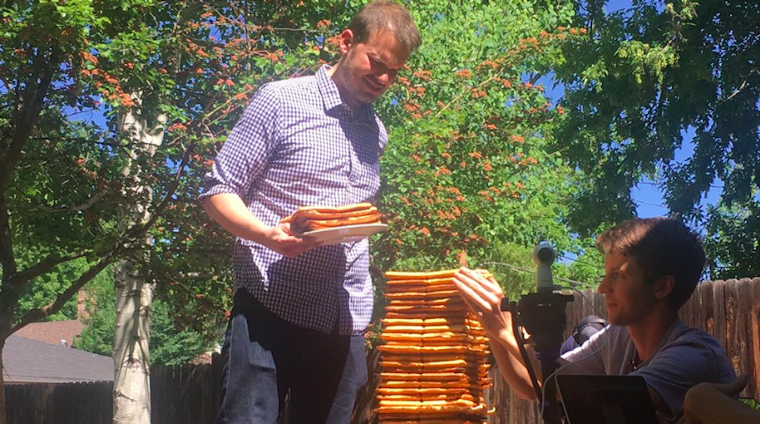 Spencer McCullough sets a new Guinness World Record for tallest waffle stack