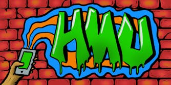 "HMU" written in green graffiti type on a brick wall