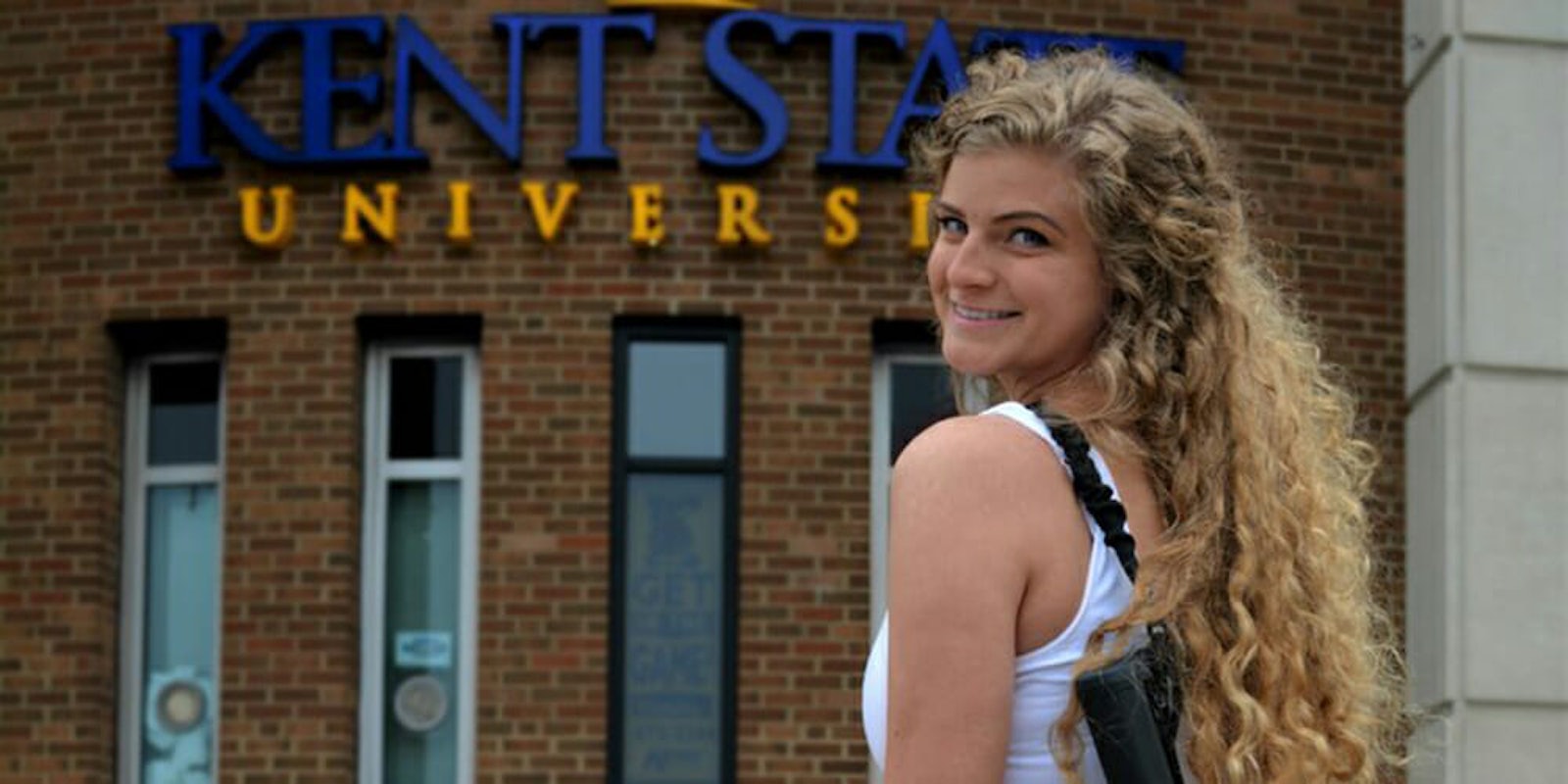 Kent State graduate Kaitlin Bennett came under fire for posing on campus with an assault rifle, and now she's claiming to be a victim of 'blatant racism.'