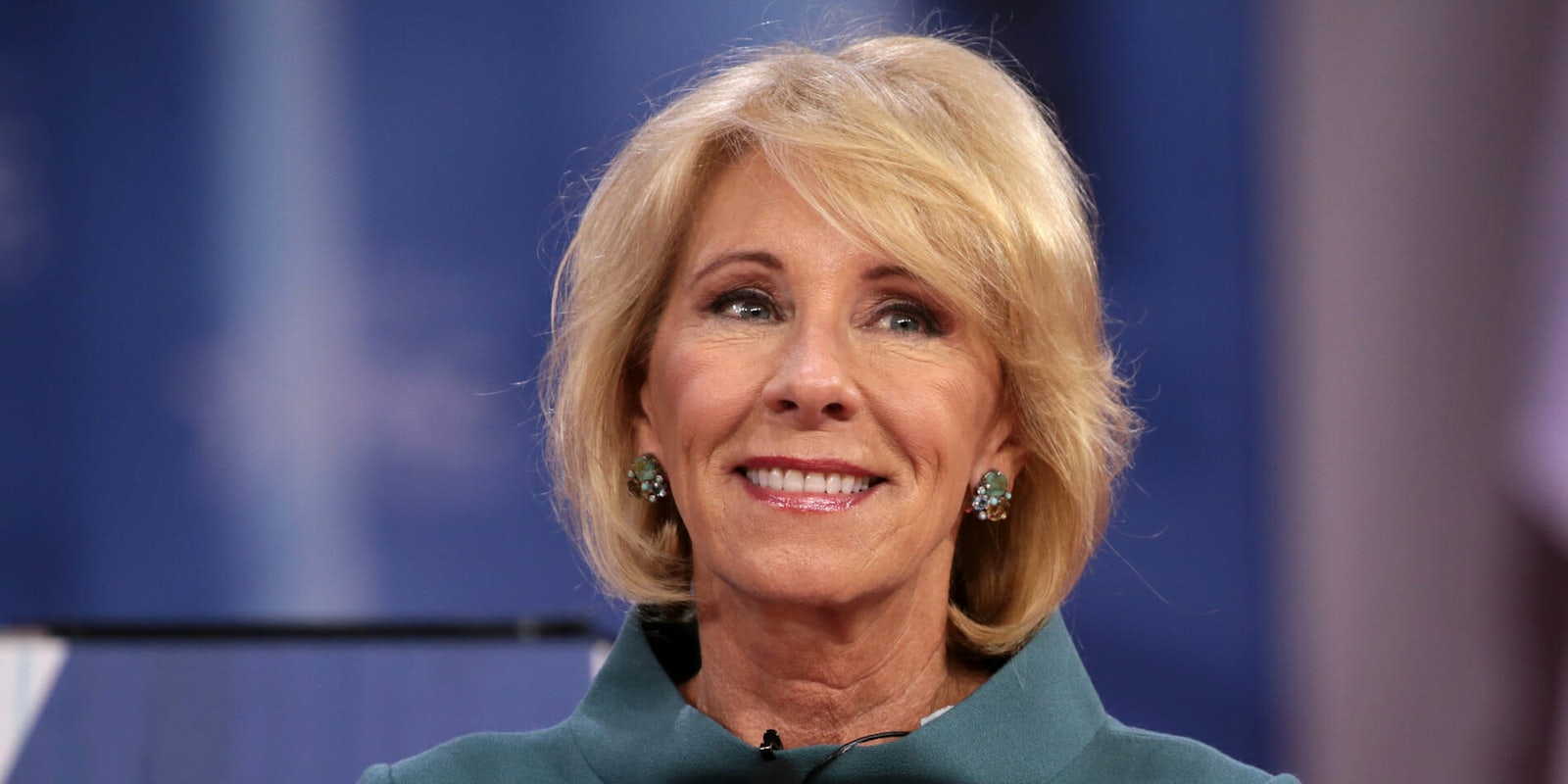 Education Secretary Betsy DeVos said guns in schools is not part of a federal school safety commission's charge when asked by a member of Congress on Tuesday afternoon. 