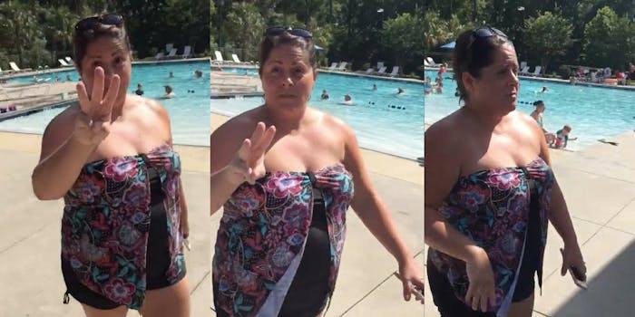 Stephanie Sebby-Strempel, called 'Pool Patrol Paula,' waving her fingers at a teenager filming her while attempting to kick the teenager out of a pool.