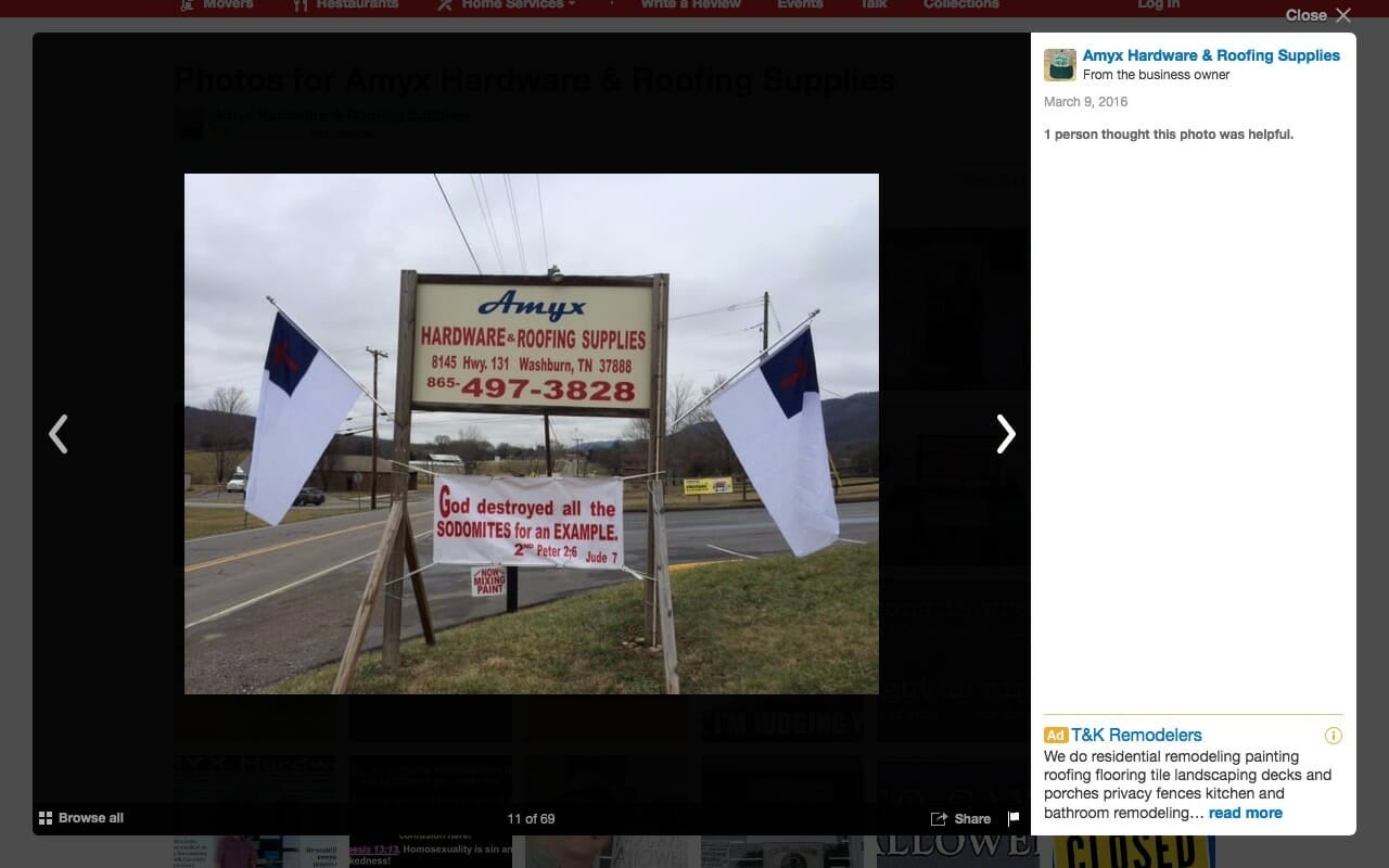 Jeff Amyx's his homophobic store sign with homophobic signage and Christian flags.