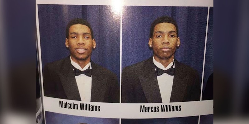 Twin brother takes class photo for both of them.