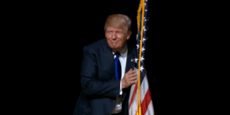 Donald Trump hugs and pats US flag animated gif