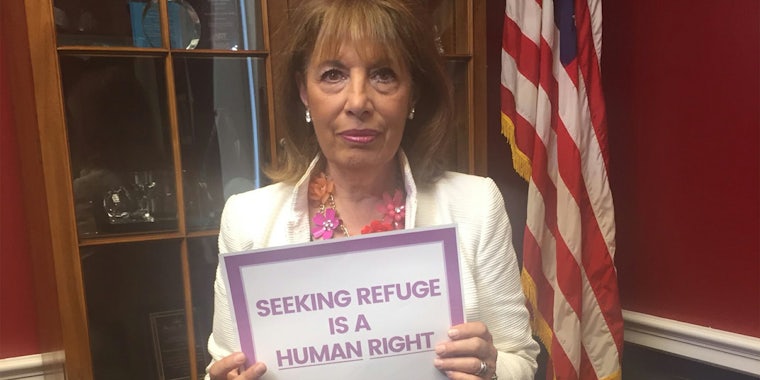 Rep. Jackie Speier holding 'Seeking refuge is a human right' sign