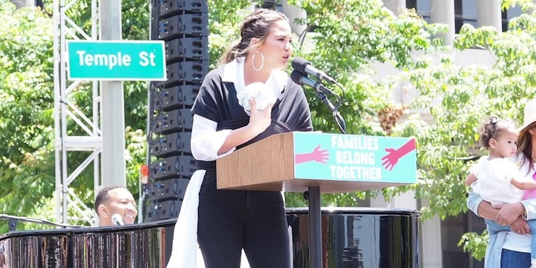 Chrissy Teigen Keep Families Together march