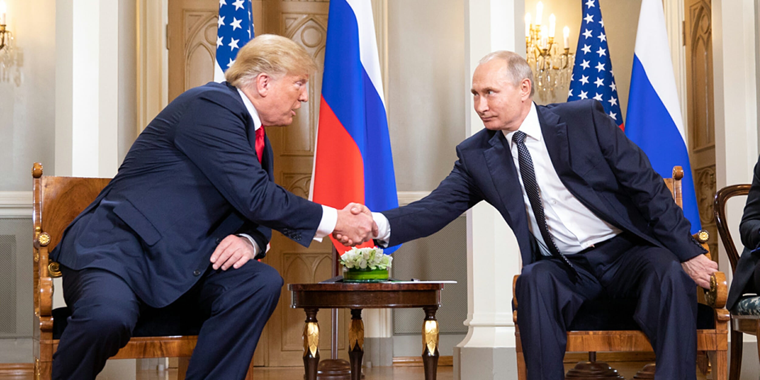 trump putin handshake