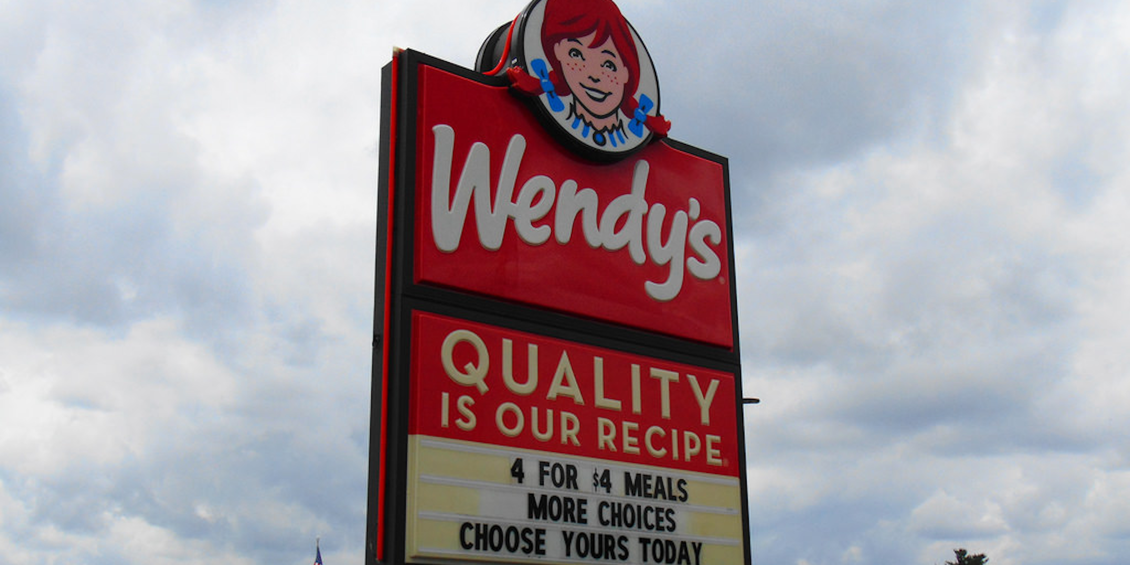 Wendy's Sign, cloudy sky background
