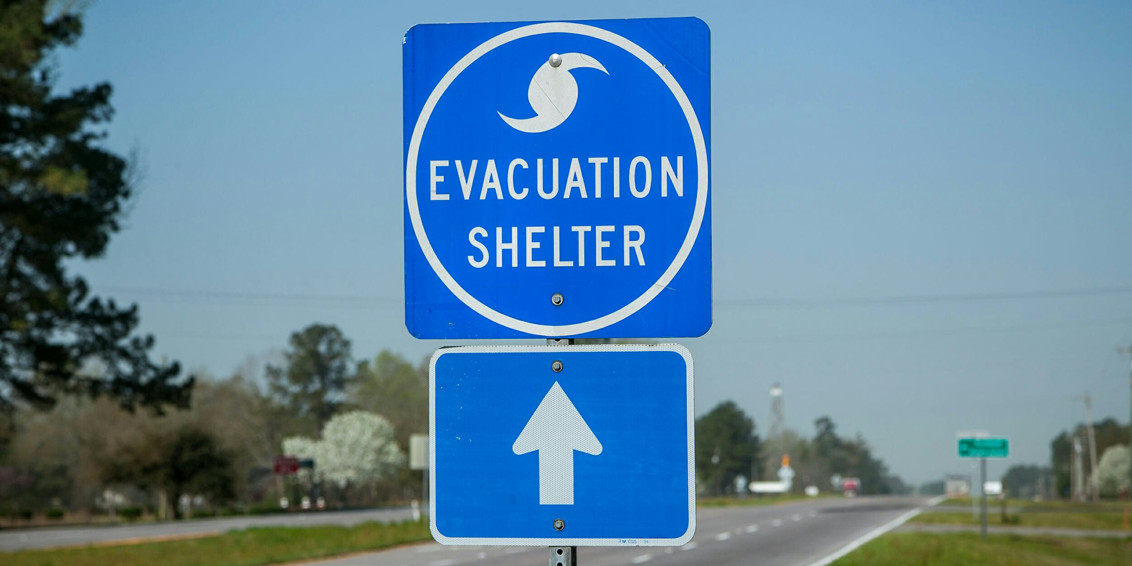 evacuation shelter highway sign