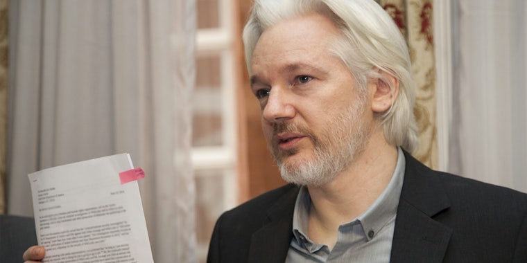 julian assange with letter