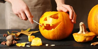carving halloween pumpkin