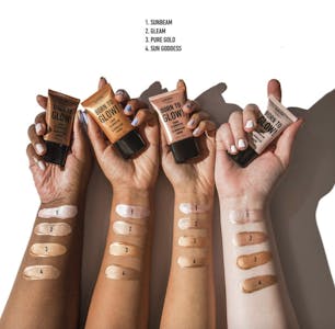 glow liquid illuminator shades on the arms of people with different skin colors