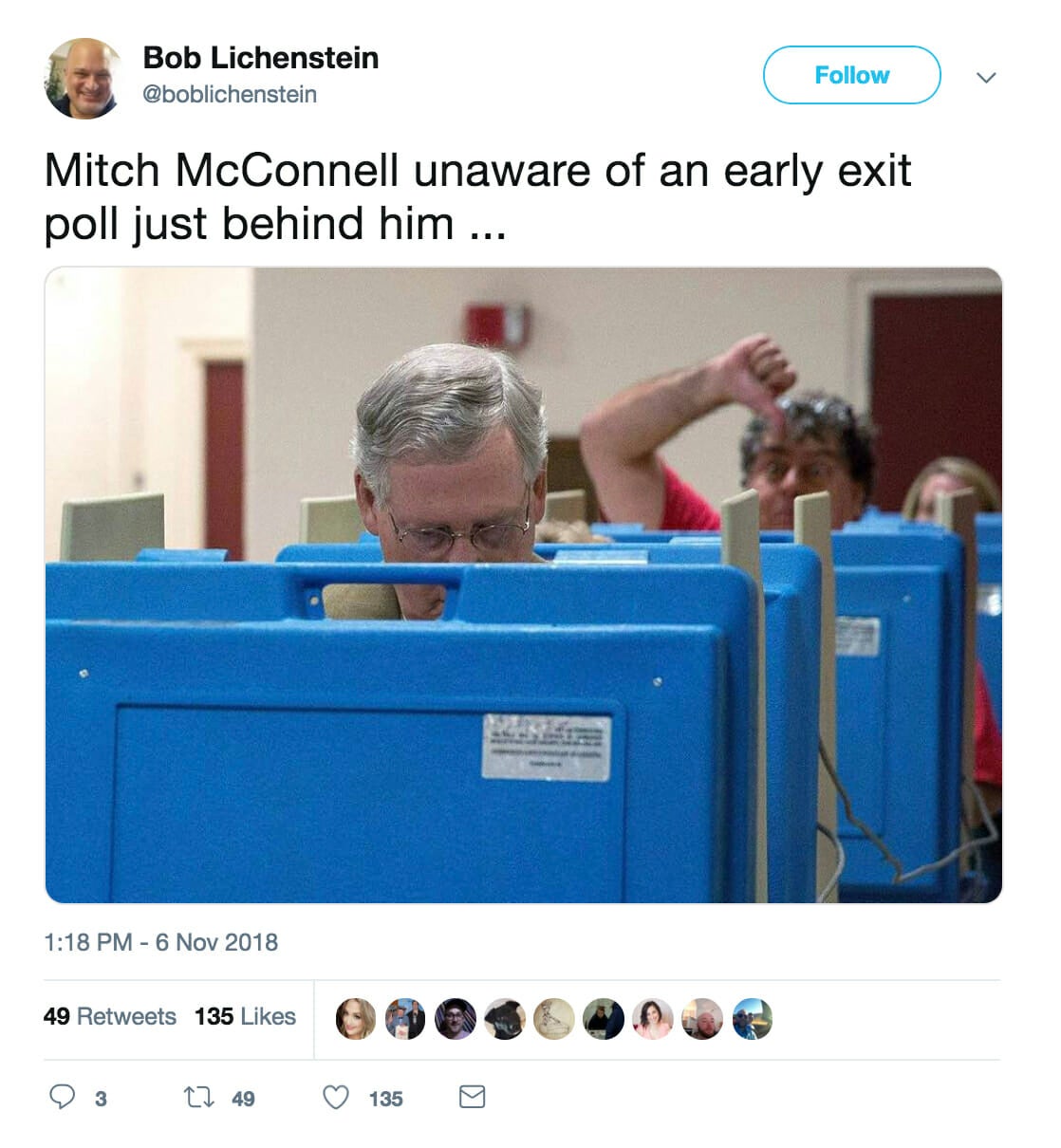 Senate Majority Leader Mitch McConnell was photobombed as he voted in the midterm elections.