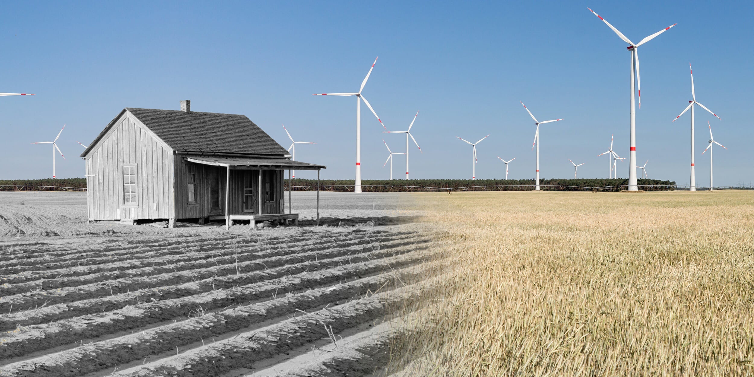 abandoned new deal era farmhouse surrounded by modern windmills