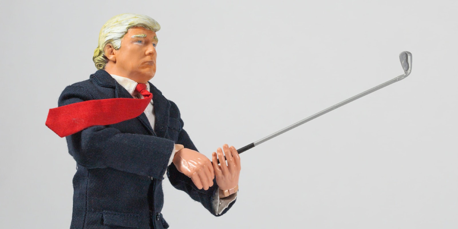 action figure trump golfing