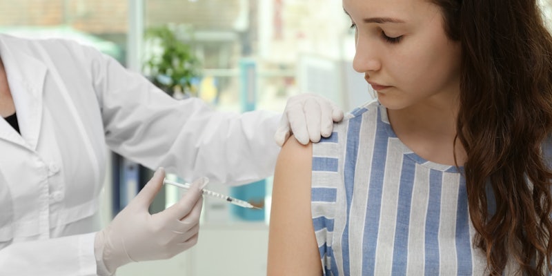 teen gets vaccination