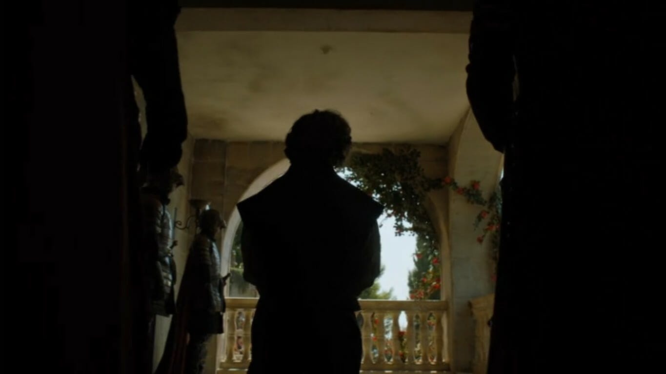 Image showing Tyrion Lannister's silhouette, flanked by guards