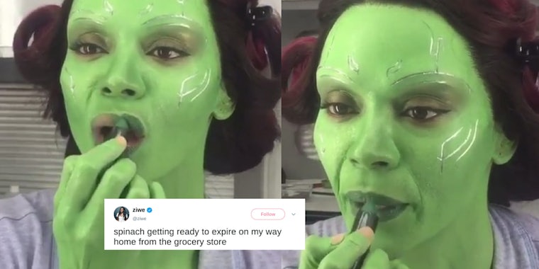 Gamora putting on lipstick