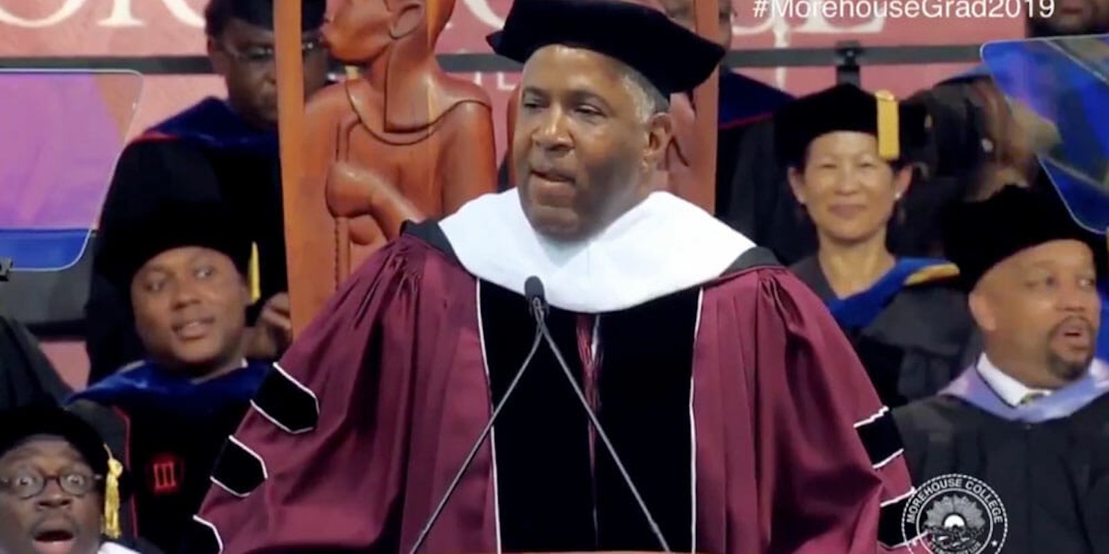 Morehouse College commencement speaker Robert F Smith makes the announcement to pay off graduating class' student loans