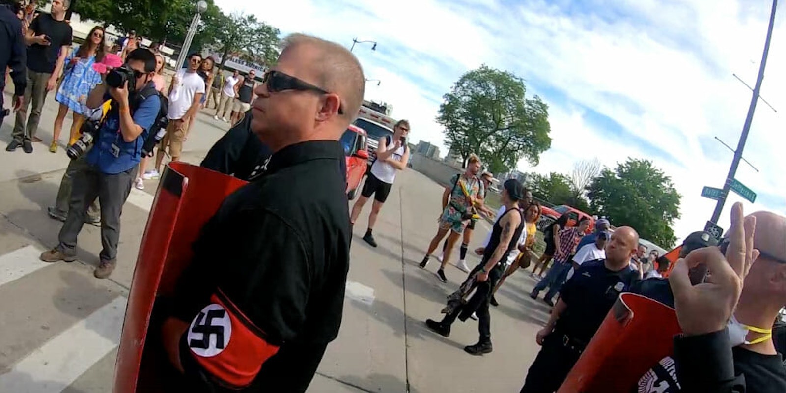 Neo-Nazis flashing white supremacy signs at Detroit Pride