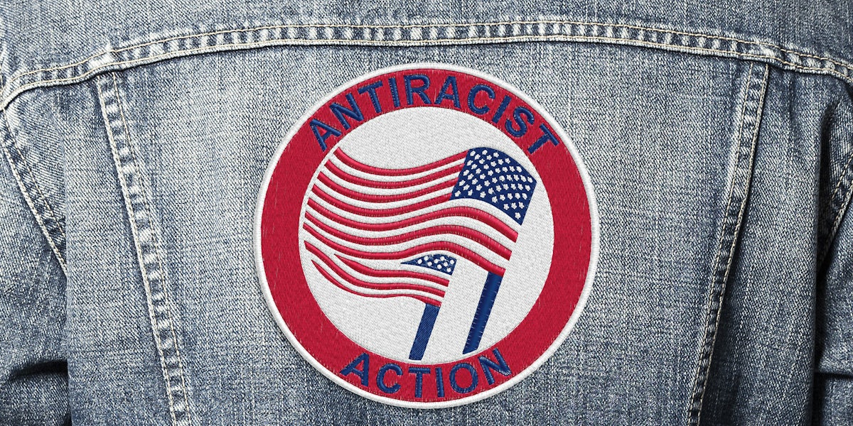 antiracist action patch on jean jacket