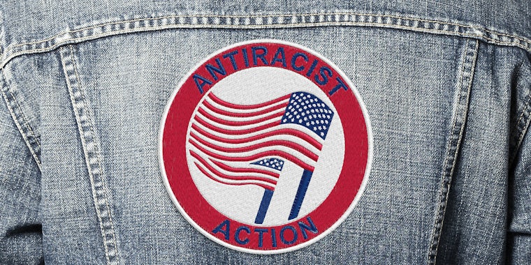 antiracist action patch on jean jacket