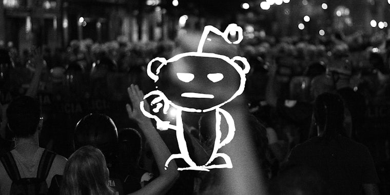 reddit snoo with raised fist over protest background