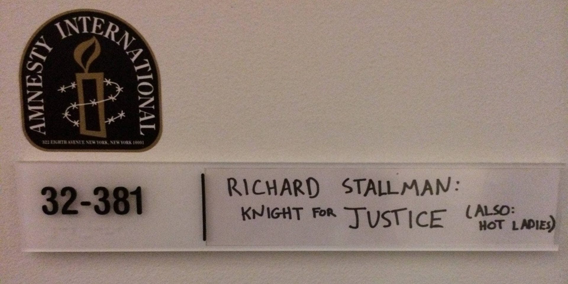 A door sign for Richard Stallman reads 'Knight for justice (also: hot ladies)