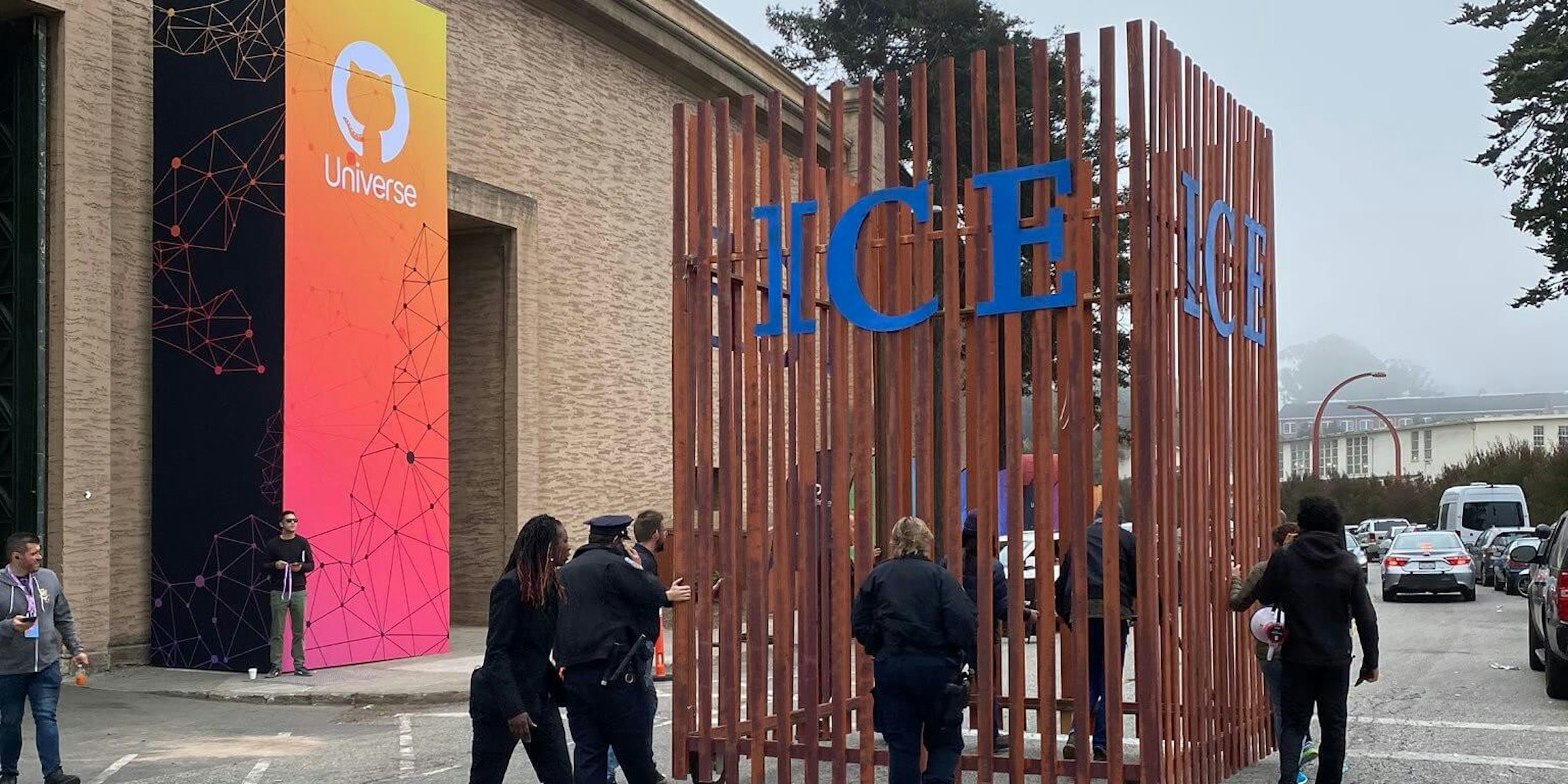 A makeshift 'ICE' cage put outside GitHub Universe event to protest its contract with ICE