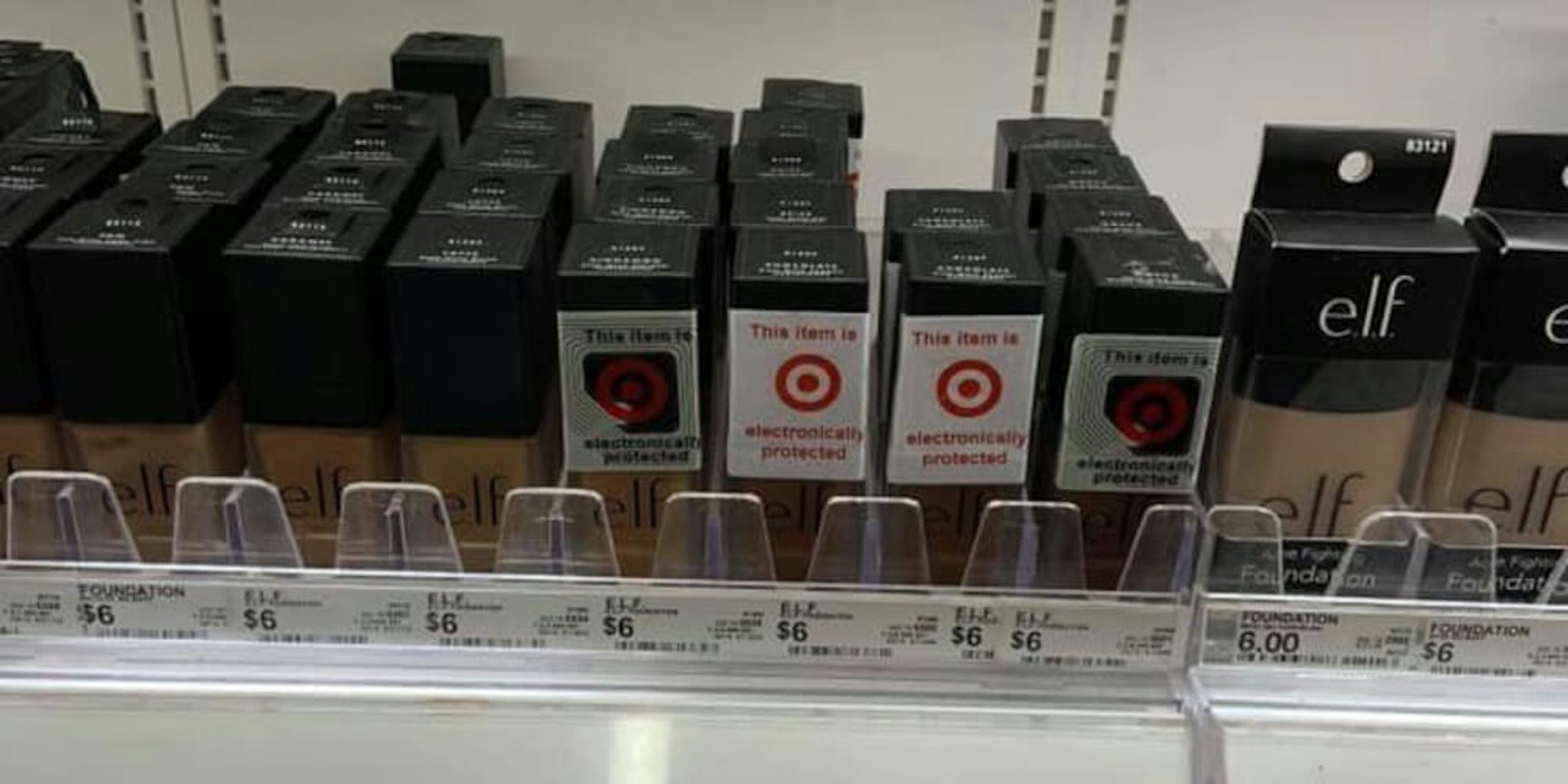 Cosmetics show anti-theft marks with the Target logo only only dark skinned products next to light skin products that don't have the device