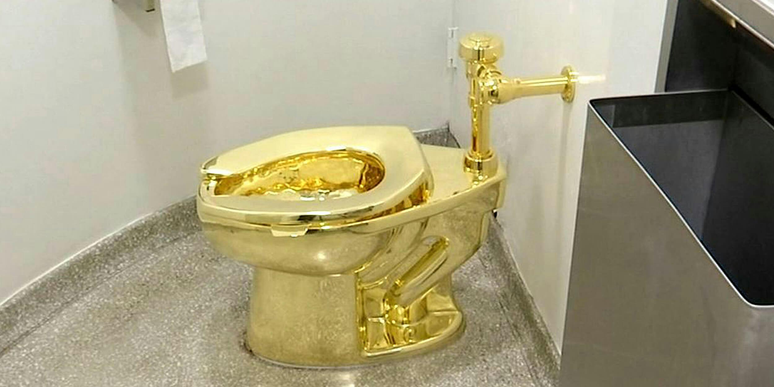 18-karat toilet, titled 'America,' by Maurizio Cattelan in the restroom of the Solomon R. Guggenheim Museum in New York