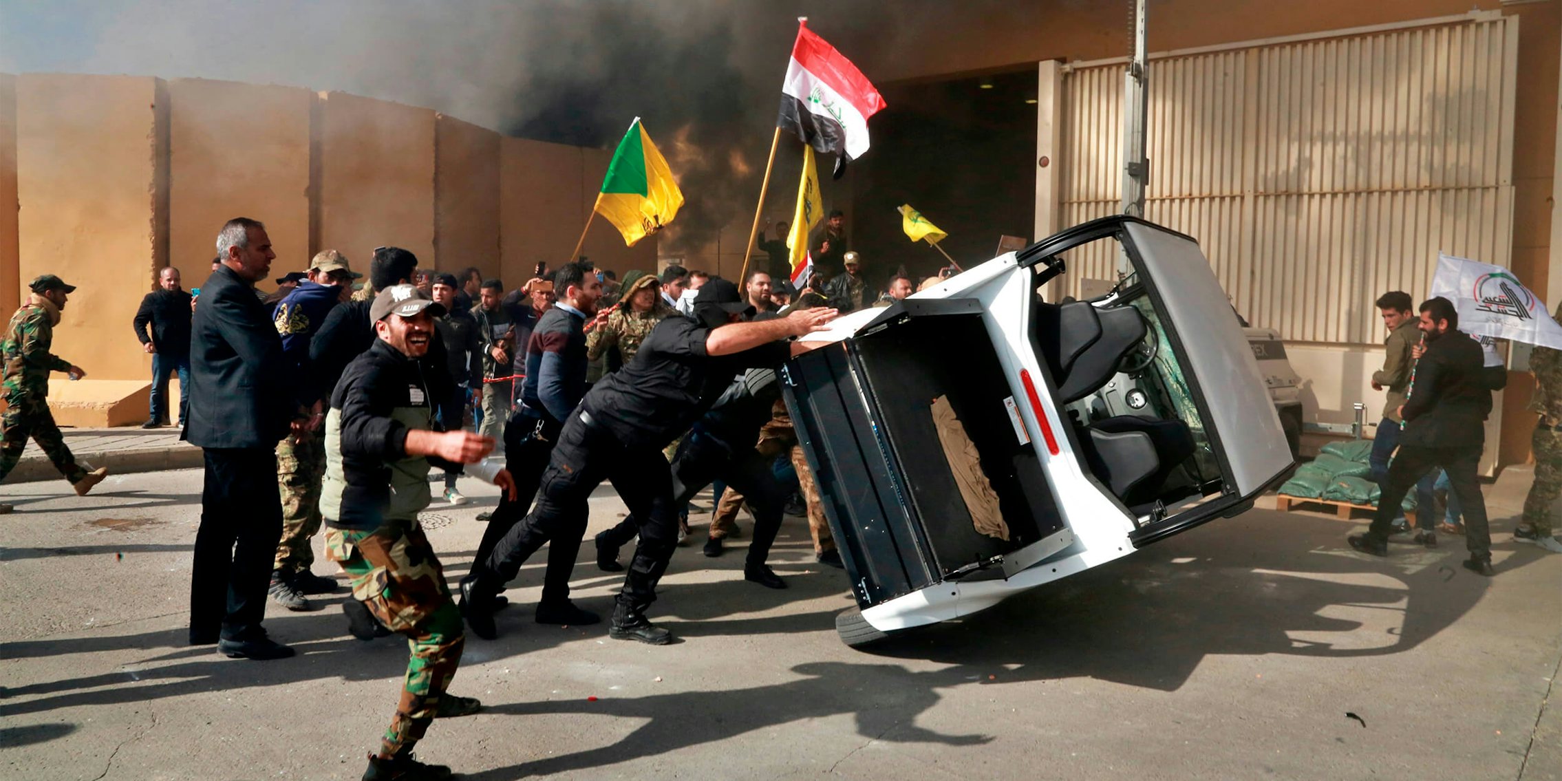 Protesters damage property inside the U.S. embassy compound, in Baghdad, Iraq